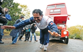 Manjit Singh, 59, pulls a double decker bus in London using ropes attached to his hair, breaking a Guiness World record by pulling it 21.2 meters.