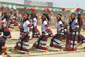 10,736 people dance in sync stretched over three kilometers for eight minutes at Aizawl, the capital of Mizoram, India to establish a new Guinness Record for the largest bamboo dance on March 12.