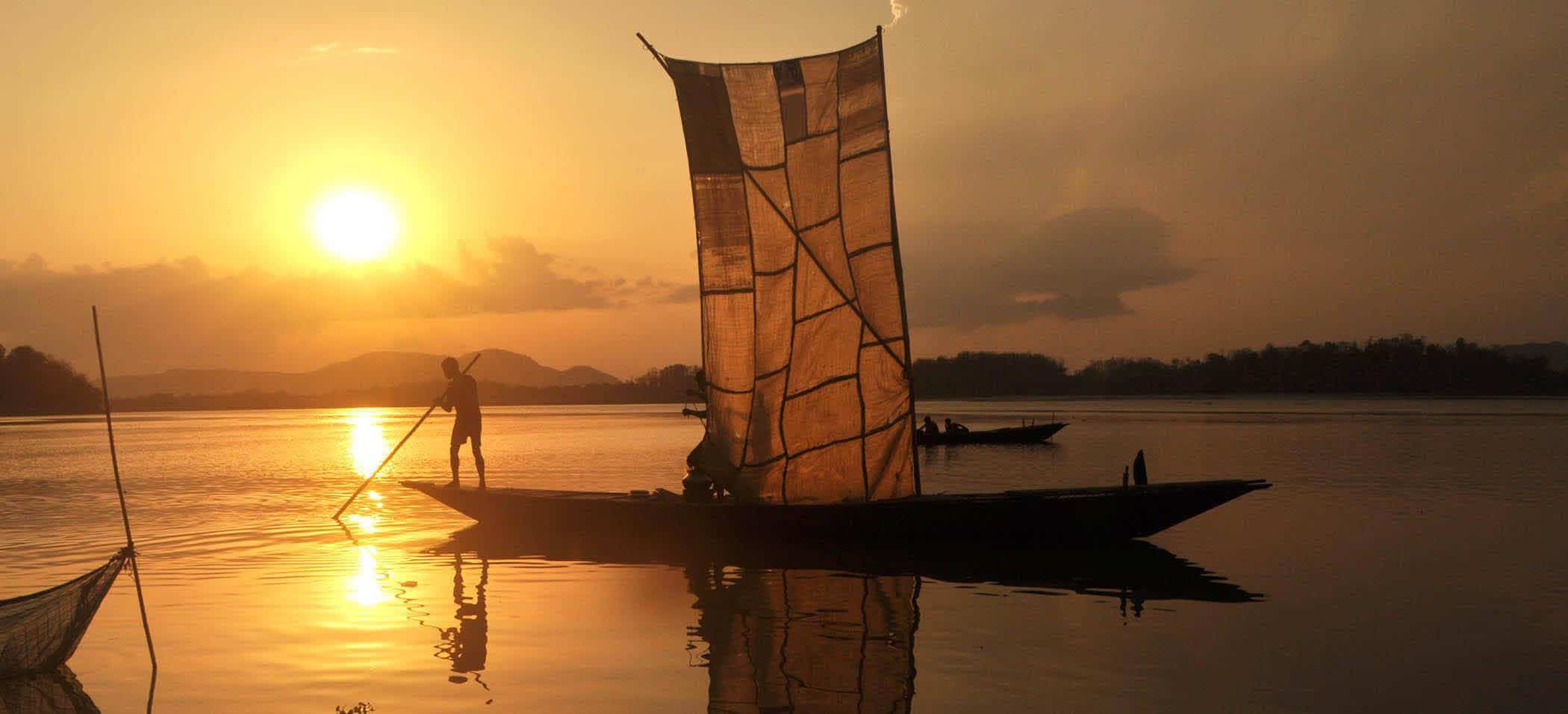 Brahmaputra River during sunset near Guwahati.