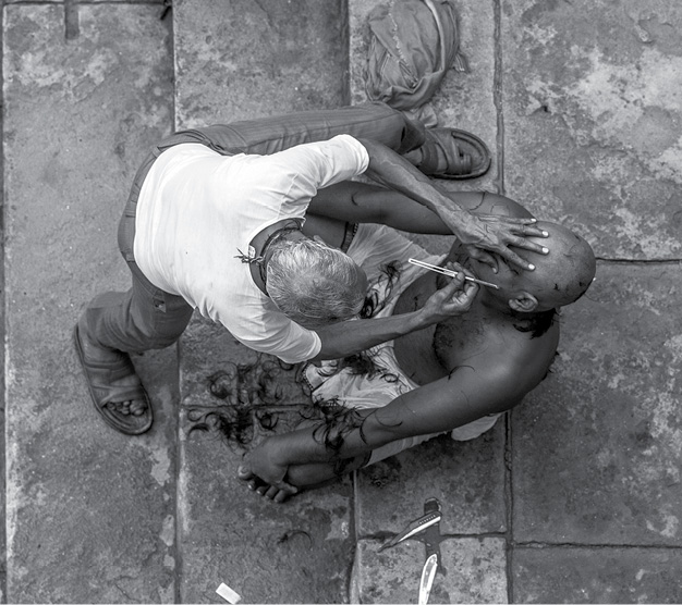 Shaving at the Varanasi Ghat