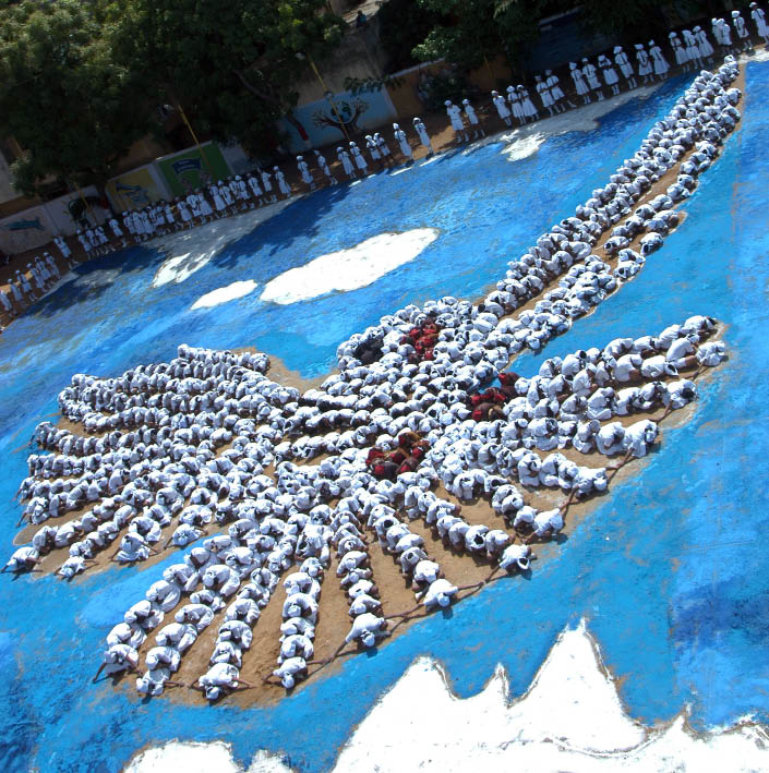 Students in Chennai make a human formation of a “Dove Flying in the Sky” to symbolize World Peace.