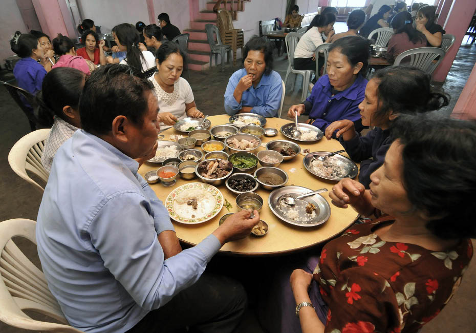 67-year-old Ziona Chana has lunch with his wives at their home in Baktawng village in Serchhip district about 70km away from Aizawl city, capital of Mizoram.