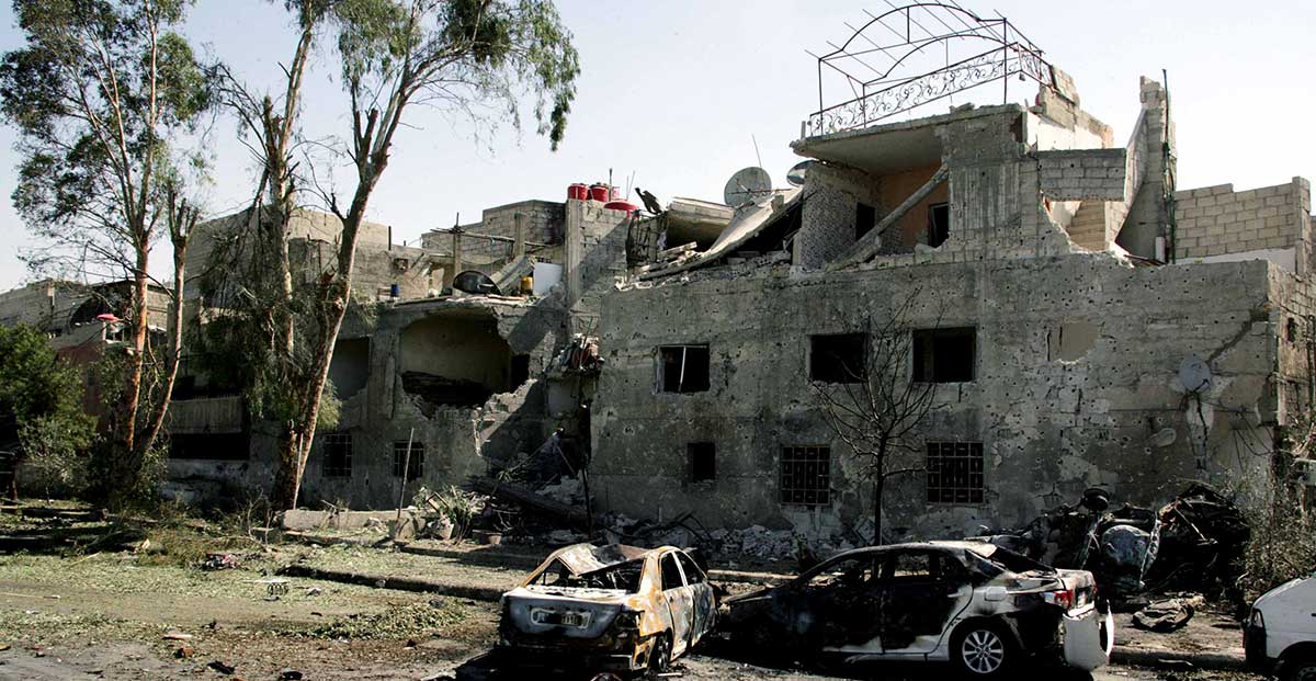 Destruction scene is seen near the airport road in Damascus, capital of Syria, on July 2, 2017