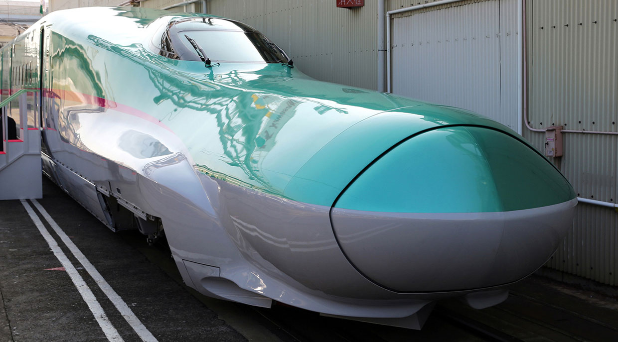 An E5 series Shinkansen bullet train sits parked on a track at Kawasaki Heavy Industries's plant in Kobe, Japan.
