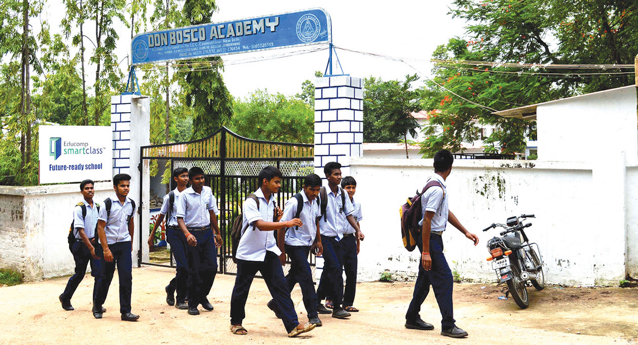 Students outside the Don Bosco Academy, created in part to provide employment opportunities to Anglo Indians.