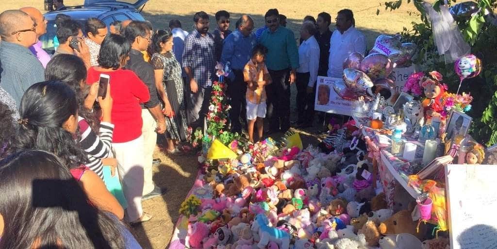 People leaving prayers, candles, and toys at the spot where Sherin Mathews was left by her father at night.