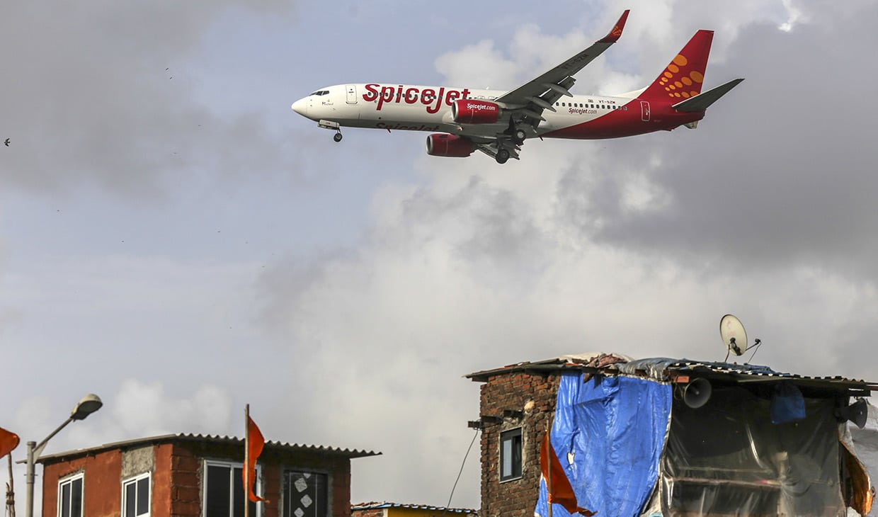 A SpiceJet plane prepares to land at Chhatrapati Shivaji International Airport in Mumbai.