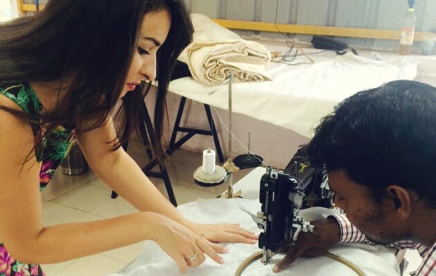 Austrian designer Vera Fritsch with an Indian artisan.