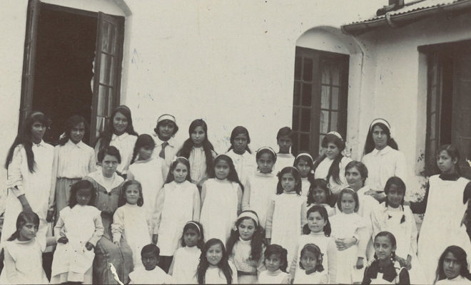 Woodburn Cottage group, Kalimpong, approx 1916. Jane McCabe’s grandmother, Lorna Peters, standing far right, with hand on hip.