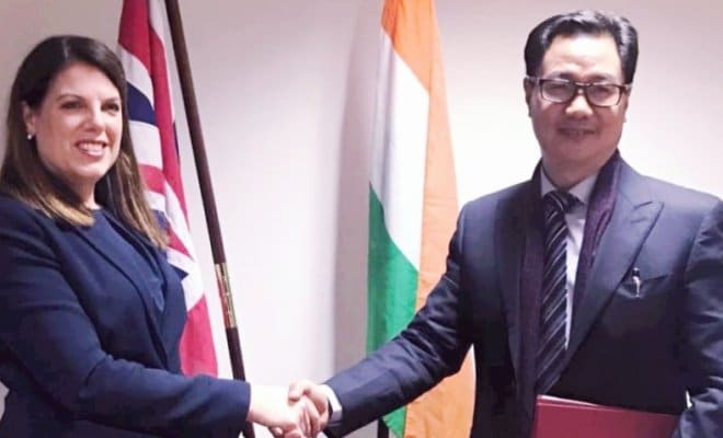 Kiren Rijiju (R) with Caroline Nokes