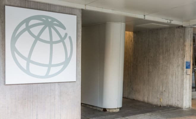 World Bank Group logo with entrance to building in Washington