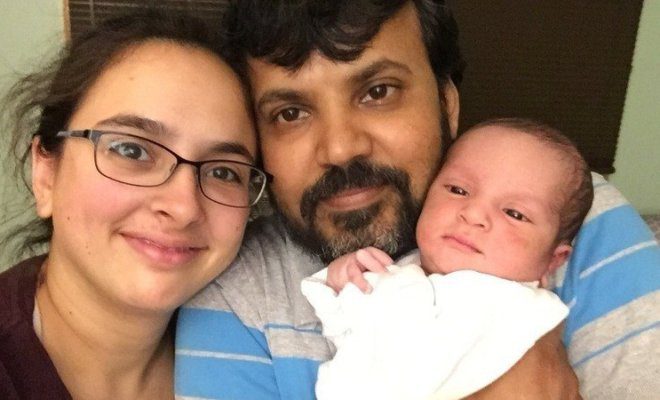Bhavesh Bhatt and Jeanne Edwards with their son.