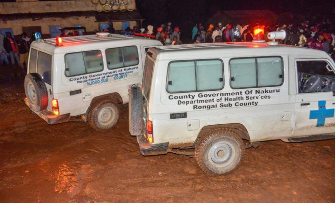 Ambulance at the scene where the dam burst near the town of Solai.