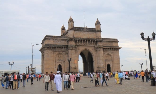 People at Gateway of India in Mumbai.