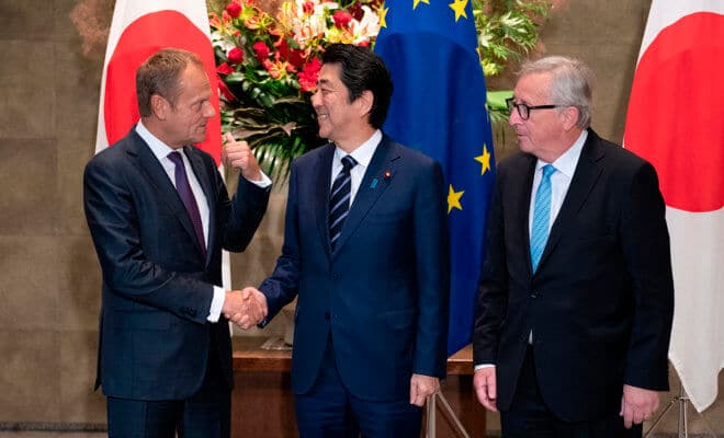Prime Minister Shinzo Abe of Japan meeting with Donald Tusk, the president of the European Council, left, and Jean-Claude Juncker, his counterpart at the European Commission, before signing a far-reaching trade deal in Tokyo, July 17, 2018.