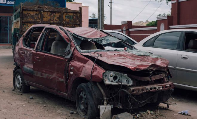 The car that was destroyed by a mob when Rukmani and her family drove to see a temple, in Polur, Tamil Nadu, India, June 10, 2018.