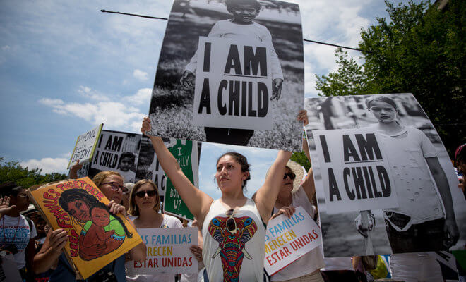 Sufia Bassett, 32, of Bethlehem, Pa., originally from Ecuador, protests against family separation Sunday in Lafayette Square in Washington, D.C.
