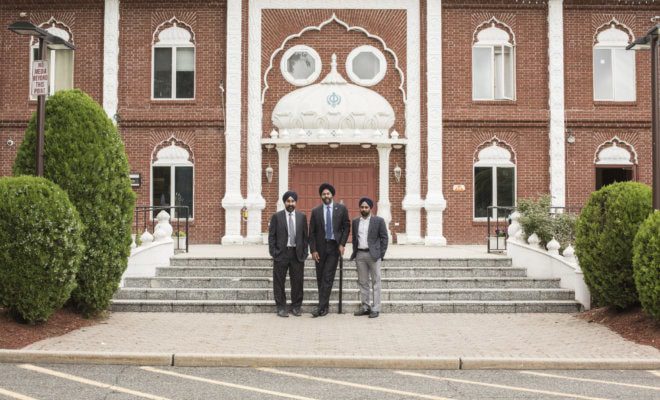 From left, Ravi Bhalla, the mayor of Hoboken, Gurbir Grewal, New Jersey’s attorney general, and Amardeep Singh, a founder of the Sikh Coalition, a civil rights group, in front of a Sikh temple in Glen Rock, N.J.