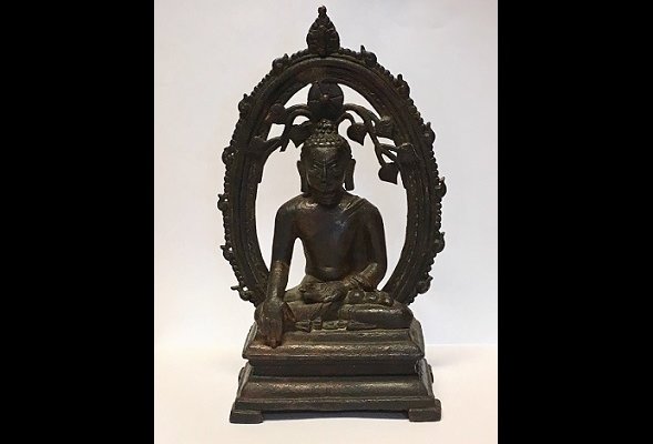 The 12th century Buddha statue returned to the Indian High Commissioner by UK's Metropolitan Police Service.