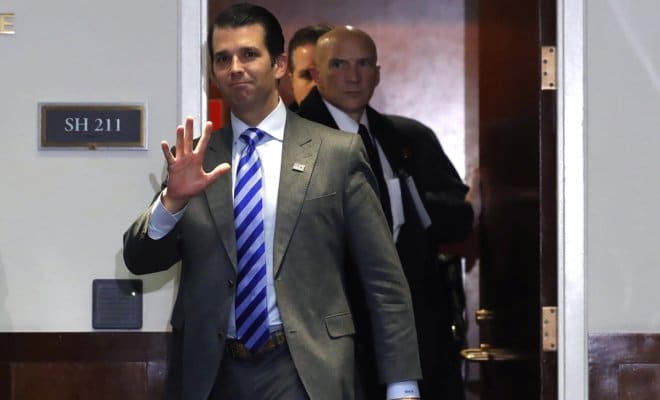 Donald Trump Jr. exits an interview with the Senate Intelligence Committee on Capitol Hill in Washington on Dec. 13, 2017.