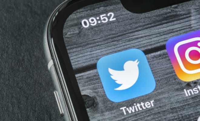 Twitter application icon on smartphone screen.