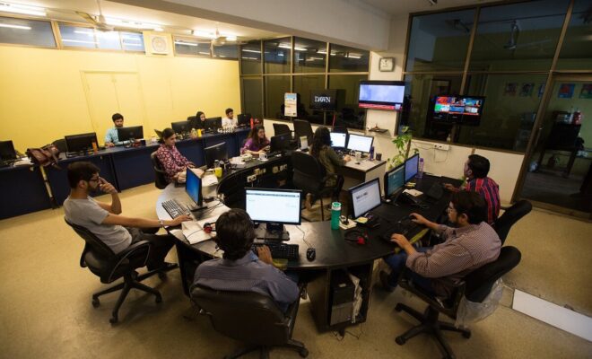 The Dawn newsroom in Karachi, Pakistan. Cyril Almeida, a columnist for the newspaper, has been summoned to appear before the High Court in Lahore on accusations of treason.