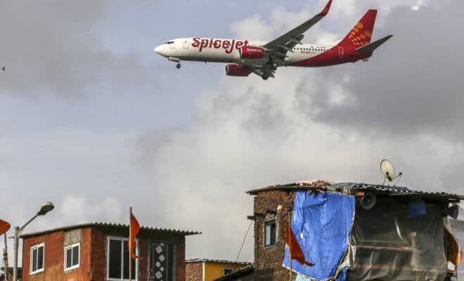 A SpiceJet plane prepares to land at Chhatrapati Shivaji International Airport in Mumbai on July 10, 2017.