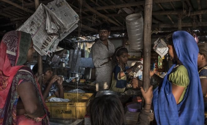 Laxman Gohel at his tea shop, which he opened with money he saved from ragpicking, in Ahmedabad, Gujarat state, India, Nov. 23, 2018. As the Federal Reserve raises rates, global investors are pulling their money out of emerging markets, damaging the world’s most vulnerable economies.